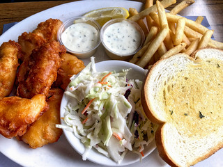 Fish and Chips with tartar sauce, salad and bread