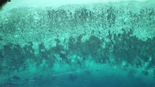 Aerial view from a drone of beautiful Nyaung Oo Phee island on sunny day in Myanmar
