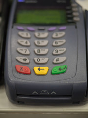 Fototapeta premium close up shot of a credit card terminal in a store