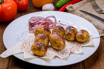 Potatoes roasted on the coals