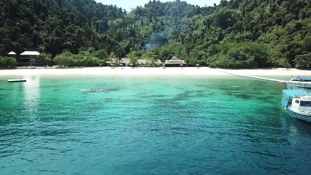 Aerial view from a drone of beautiful Nyaung Oo Phee island on sunny day in Myanmar
