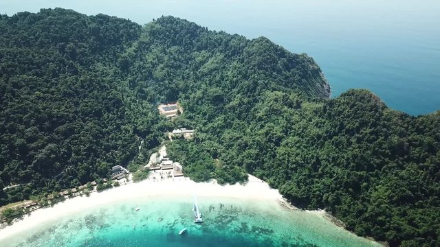 Aerial view from a drone of beautiful Nyaung Oo Phee island on sunny day in Myanmar
