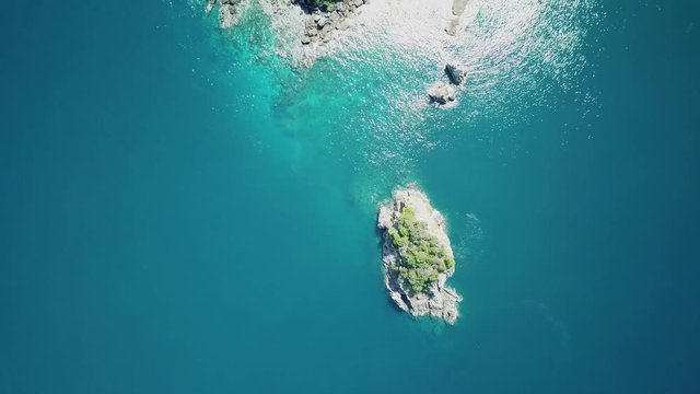 Aerial view from a drone of beautiful Nyaung Oo Phee island on sunny day in Myanmar
