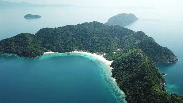 Aerial view from a drone of beautiful Nyaung Oo Phee island on sunny day in Myanmar
