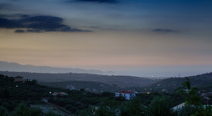 Fototapeta premium Bush plantation and town, Crete, Greece
