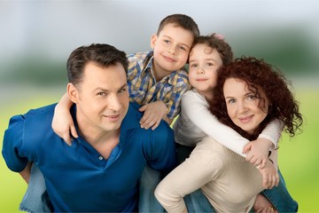 Fototapeta premium Beautiful Lovely family in park