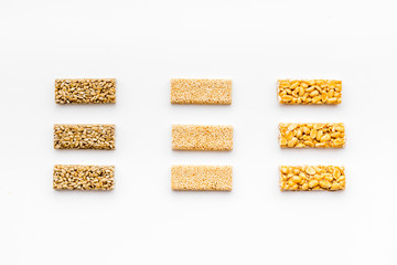 Sport bars for fast energy. White background top view pattern