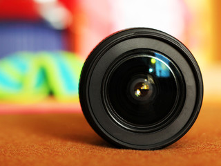 Photo lens with lens reflections, color background