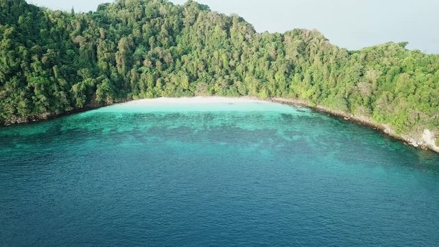 Aerial view from a drone of beautiful Nyaung Oo Phee island on sunny day in Myanmar
