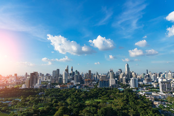 modern office buildings and condominium in Bangkok city downtown with sunset sky and clouds at Bangkok , Thailand. Lumpini park .
