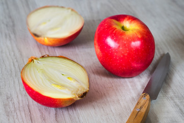 Cut apple with onions inside.