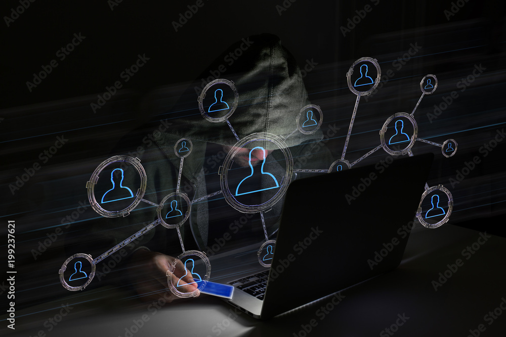 Poster hacker man in the dark using computer to hack data and information system