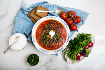 Traditional soup Borsh on marble background