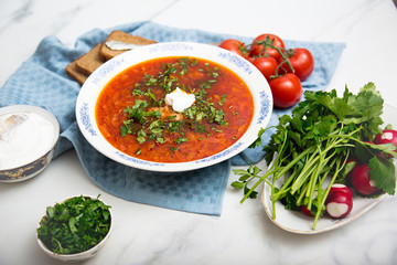 Traditional soup Borsh on marble background