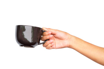 Close up of hand holding coffee cup.