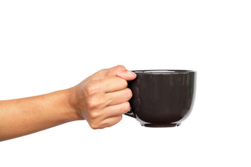 Close up of hand holding coffee cup.