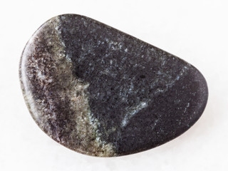 polished olivinite stone on white