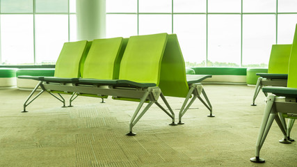 empty airport terminal waiting area with chairs. lounge in the airport with seats