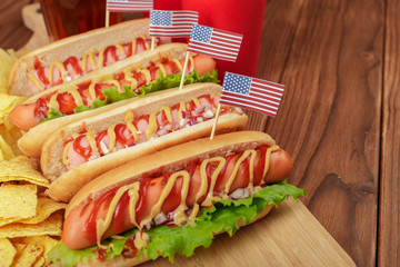 Hot dogs on wooden background