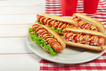 Hot dogs on wooden background