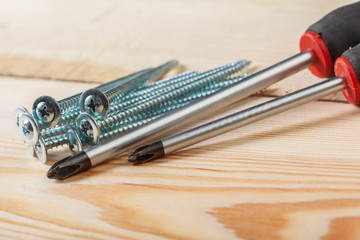 screws on a wooden table