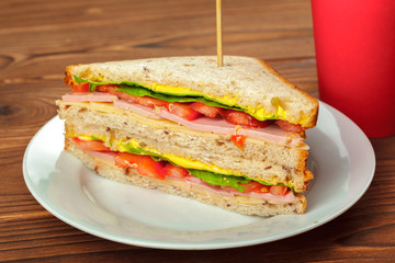 sandwich on a wooden table