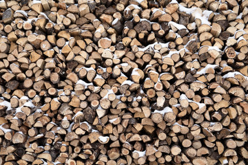 Background of wooden logs. Year rings. Pile wood