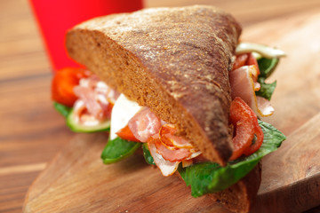 sandwich on a wooden table
