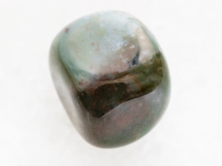 tumbled Bloodstone (Heliotrope) gemstone on white