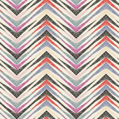 Seamless zigzag grey, orange stripes on beige background.
