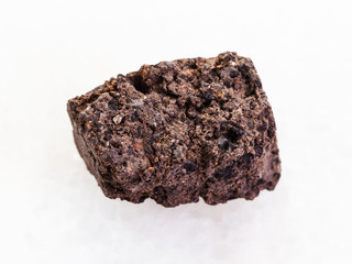 rough Peat Turf stone on white marble