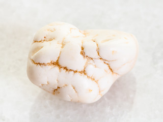 polished magnesite stone on white marble