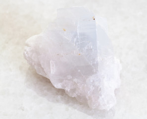 rough crystalline Magnesite stone on white