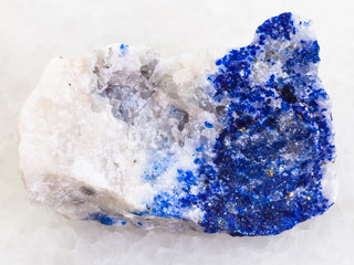 lapis lazuli stone on white marble