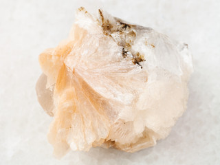 Thomsonite stone on white marble