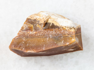 rough brown Flint stone on white