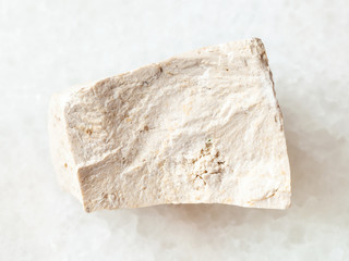 rough chemical limestone stone on white
