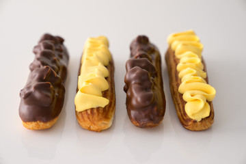 Traditional French eclairs. Good Breakfast. Closeup. On white background