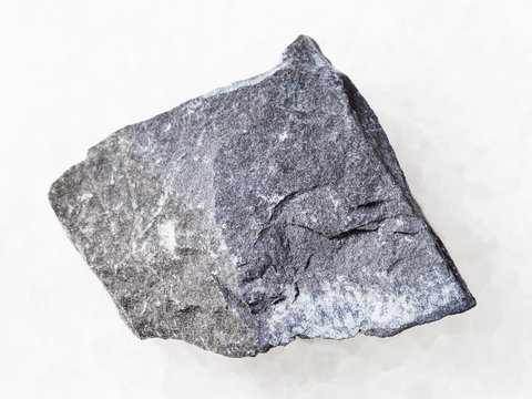 rough argillite stone on white