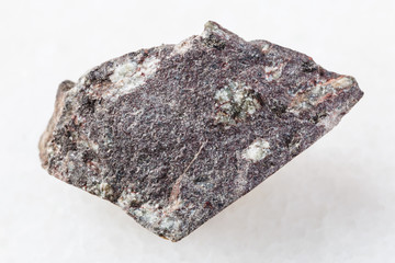 raw porphyritic Basalt stone on white