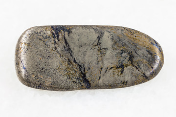 Arsenopyrite gemstone on white