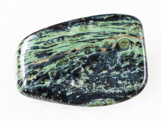 polished rhyolite gemstone on white