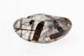 polished quartz stone with Tourmaline crystals © vvoe