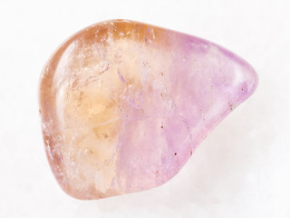 polished Ametrine gemstone on white