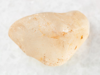 polished Topaz gemstone on white