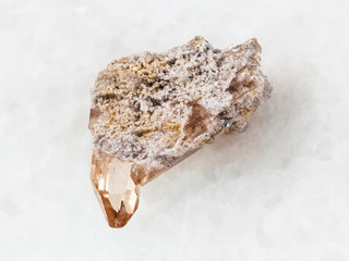crystal of topaz stone on white