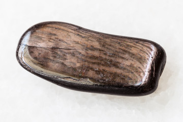 polished Hypersthene stone on white