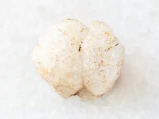 raw crystal of analcime gemstone on white