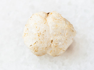 rough crystal of analcime gemstone on white