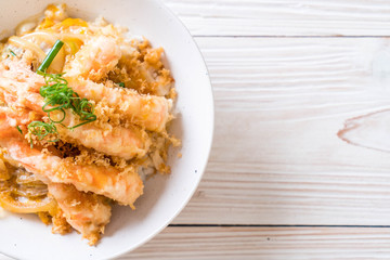 fried shrimps tempura on topped rice bowl